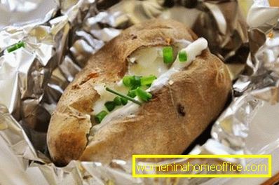 Oven baked potato with cheese in foil