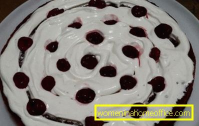 One of the cakes to grease with cooled syrup cherries and cream